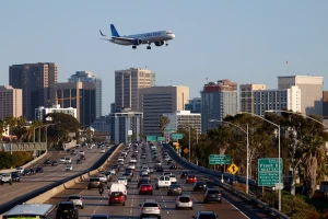 A United Airlines Airbus A321 airplane approaches San Diego International Airport for a landing from Chicago on April 8. (Kevin Carter-Getty Images) · Kevin Carter via Getty Images