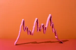 Pink Graph Line on Orange Backdrop