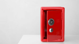 Comex inventories plummet open empty red combination vault safe representing a "vault run"