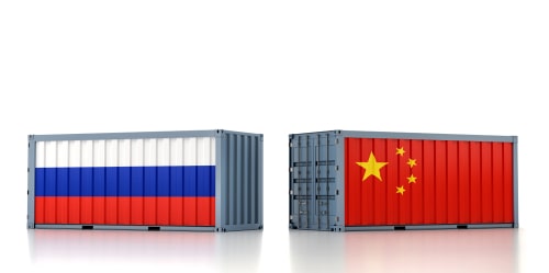Russia China Two Shipping Containers showing the Russian and Chinese flags